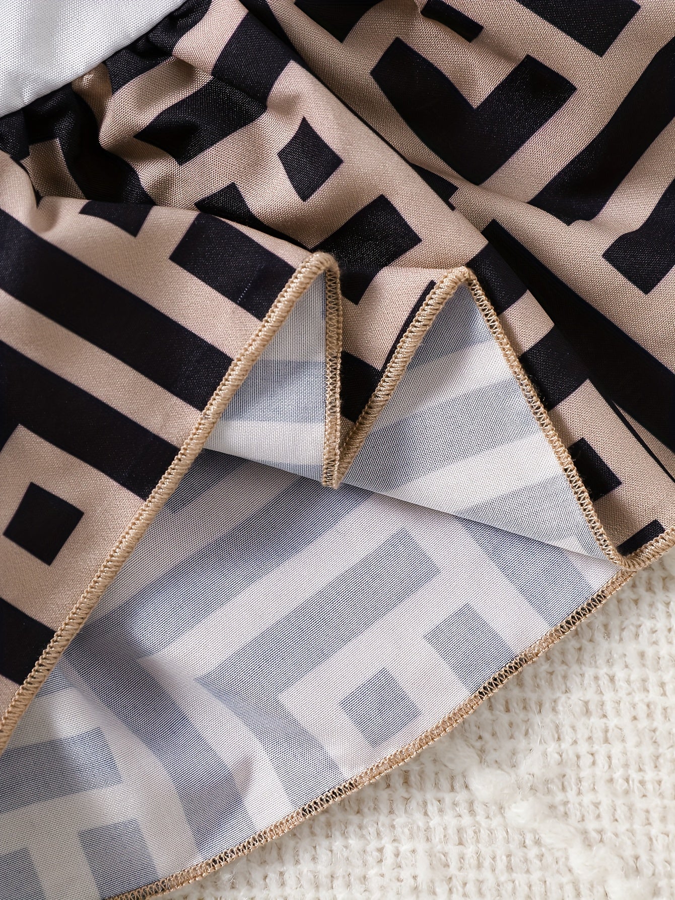 Ruffle Sleeve Top & Geometric Suspender Skirt