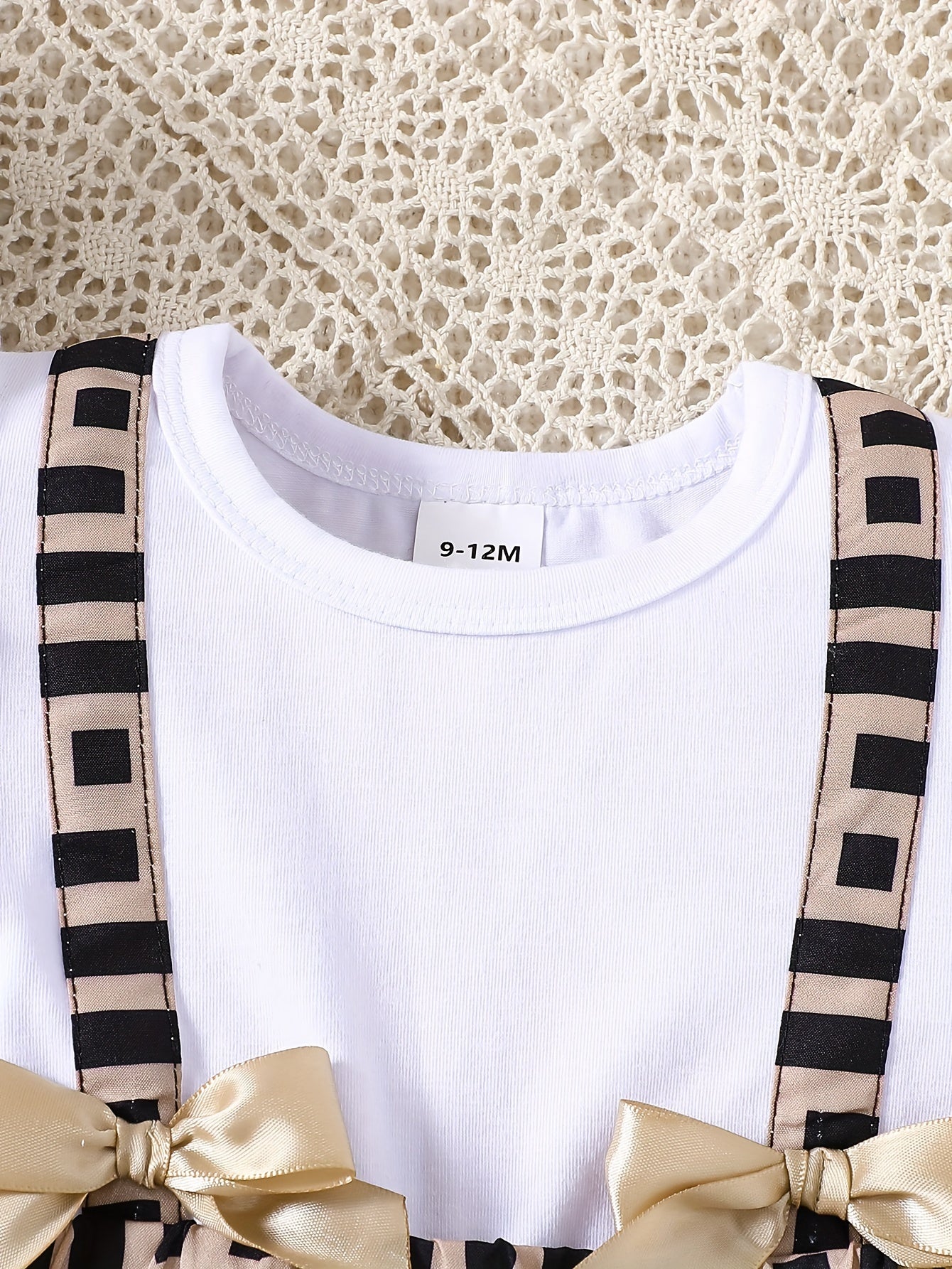 Ruffle Sleeve Top & Geometric Suspender Skirt